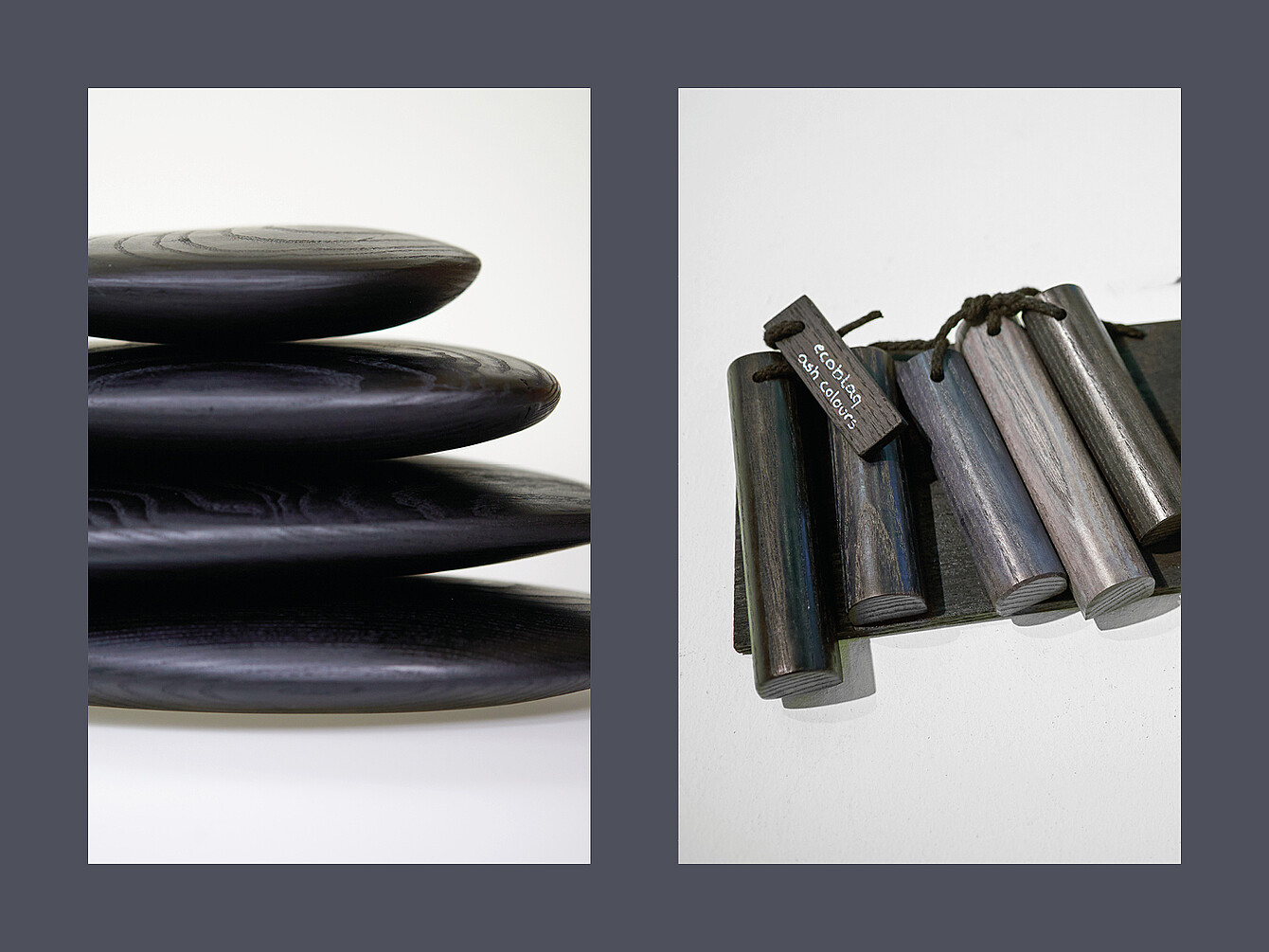 Links sind vier flache, runde, schwarze Scheiben übereinander gestapelt, rechts liegen fünf zylindrische schwarze Holzstücke mit einem Anhänger auf weißem Untergrund.