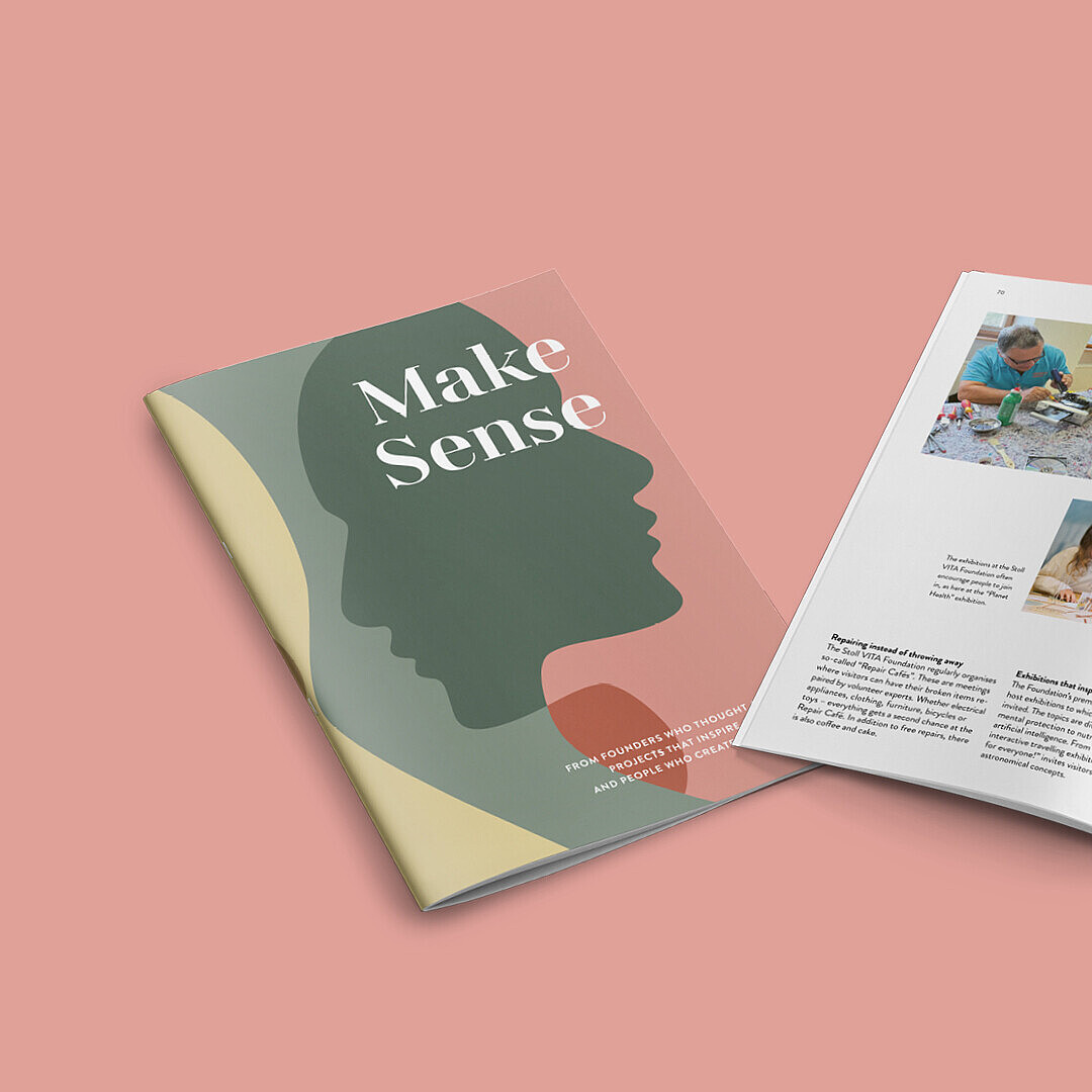 Open booklet titled 'Make Sense' featuring a silhouette profile on the cover. Inside, images of children engaged in activities and a scenic view of a building.