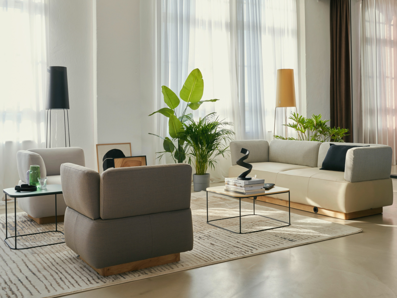 Sofa and armchair in lounge setting