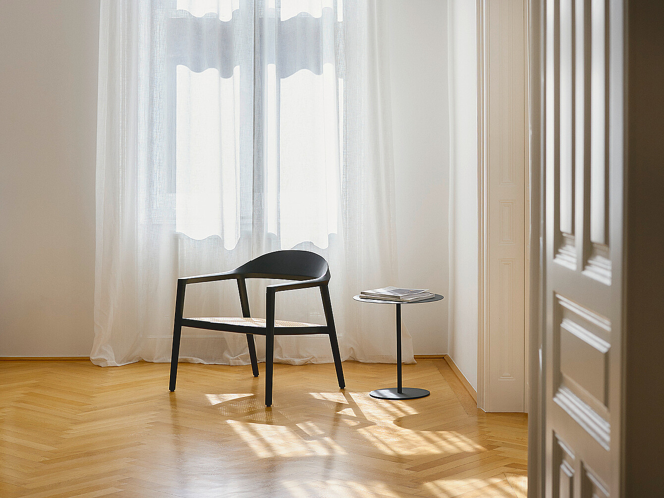 se:cafe wooden chair in front of a window