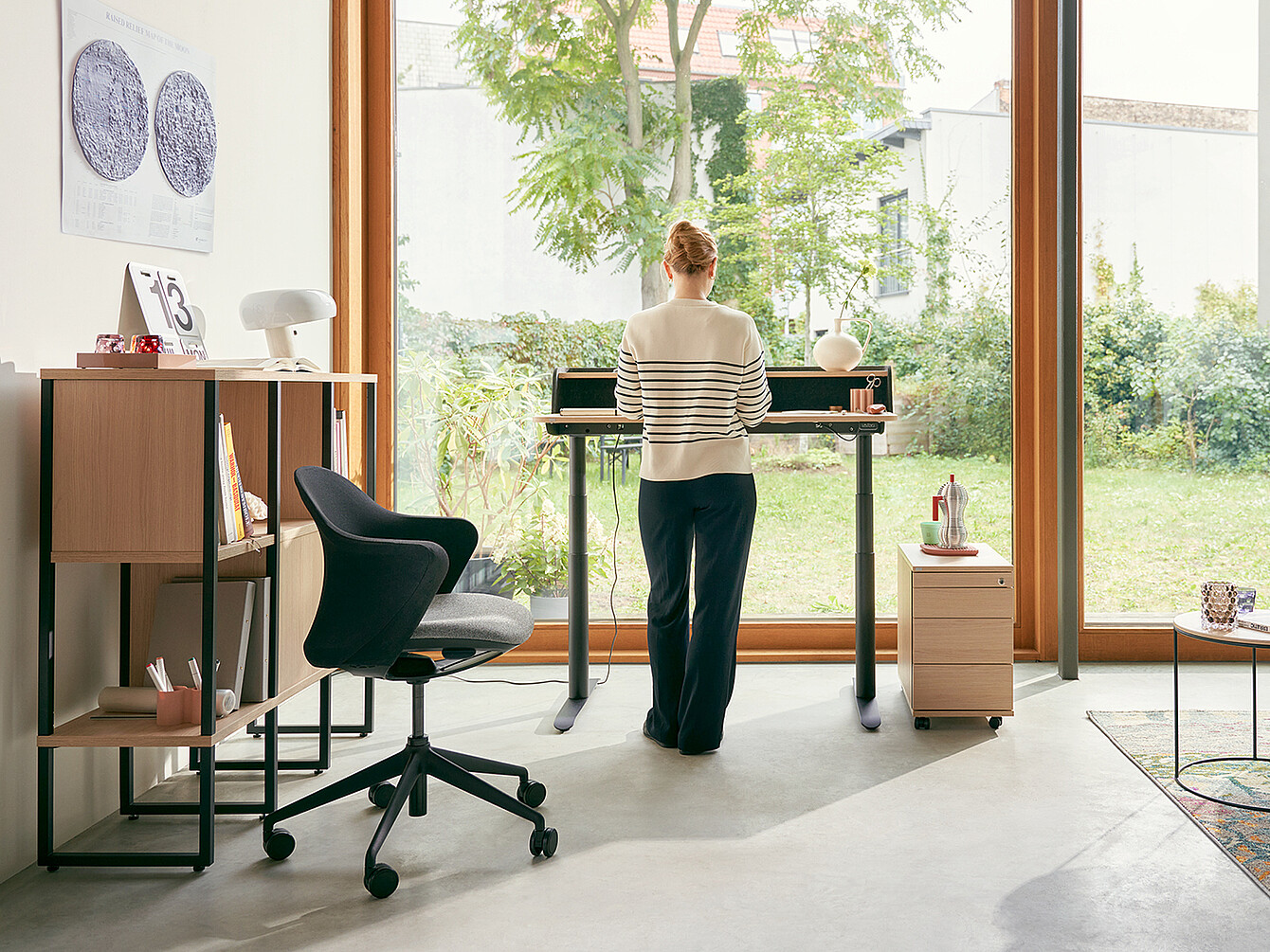 Woman standing at desk