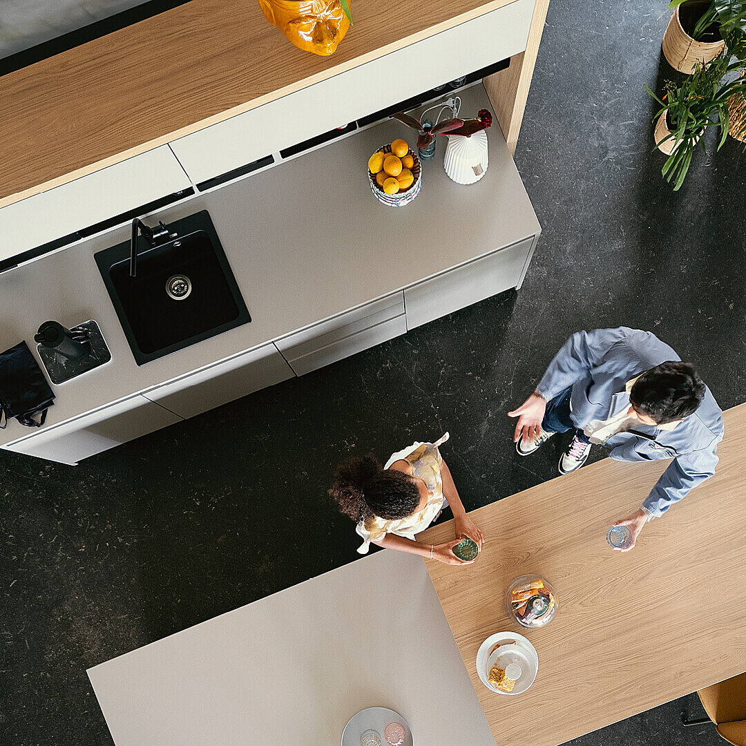 Woman and man talking in the office